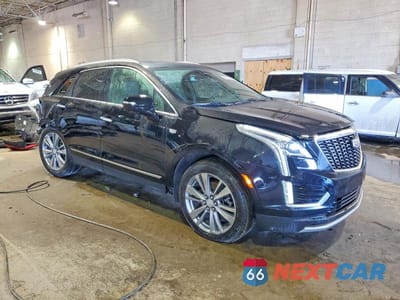 Czwarte zdjęcie samochodu z boku: 2023 CADILLAC XT5 PREMIUM LUXURY VIN:1GYKNDRS2PZ204109 - miniatura