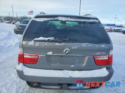 Zdjęcie 6 z 14 samochodu: 2004 BMW X5 3.0I VIN:5UXFA135X4LB09351 - miniatura