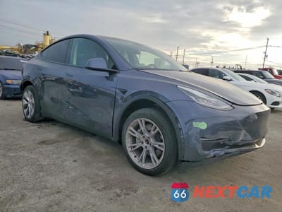 Czwarte zdjęcie samochodu z boku: 2023 TESLA MODEL Y VIN:7SAYGDEE6PA117037 - miniatura