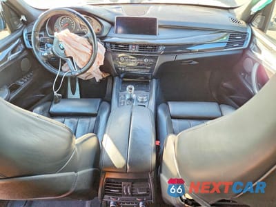 Zdjęcie 8 z 14 samochodu: 2018 BMW X5 M VIN:5YMKT6C57J0X21323 - miniatura