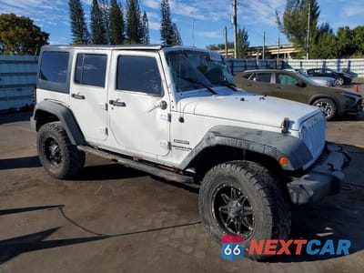 Czwarte zdjęcie samochodu z boku: 2014 JEEP WRANGLER UNLIMITED SPORT VIN:1C4BJWDG7EL156610 - miniatura