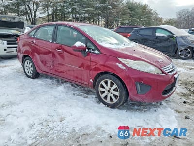 Czwarte zdjęcie samochodu z boku: 2011 FORD FIESTA SE VIN:3FADP4BJ1BM170481 - miniatura