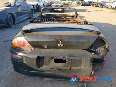 Zdjęcie 6 z 11 samochodu: 2002 MITSUBISHI ECLIPSE SPYDER GT VIN:4A3AE85H72E054210 - miniatura