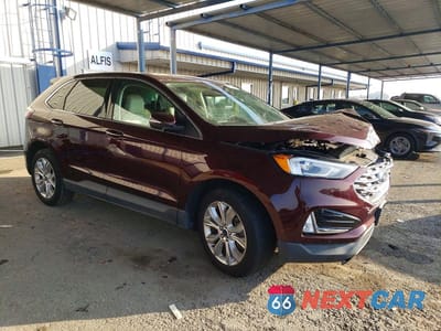 Czwarte zdjęcie samochodu z boku: 2021 FORD EDGE TITANIUM VIN:2FMPK4K93MBA18116 - miniatura