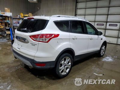 Trzecie zdjęcie samochodu z tyłu: 2016 FORD ESCAPE TITANIUM VIN:1FMCU9J97GUB18189 - miniatura
