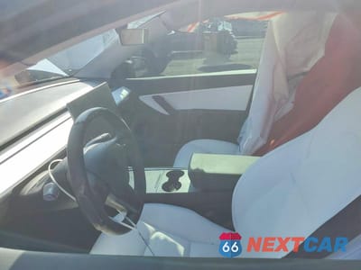 Zdjęcie 7 z 12 samochodu: 2022 TESLA MODEL Y VIN:7SAYGDEF2NF350499 - miniatura