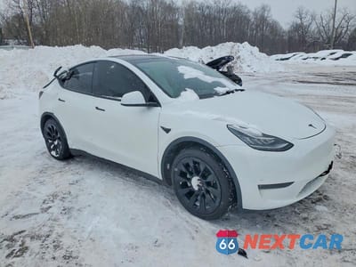 Czwarte zdjęcie samochodu z boku: 2023 TESLA MODEL Y VIN:7SAYGDEE6PA113280 - miniatura