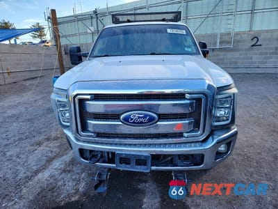 Piąte zdjęcie samochodu w środku: 2011 FORD F350 SUPER DUTY FLATBED TRUCK VIN:1FT8W3BT7BEB14187 - miniatura