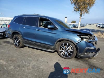 Czwarte zdjęcie samochodu z boku: 2019 HONDA PILOT TOURING VIN:5FNYF6H95KB054308 - miniatura
