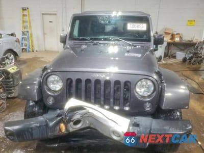 Piąte zdjęcie samochodu w środku: 2014 JEEP WRANGLER UNLIMITED SAHARA VIN:1C4HJWEG0EL174181 - miniatura