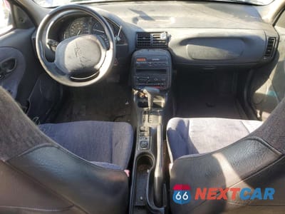 Zdjęcie 8 z 12 samochodu: 1999 SATURN SL1 VIN:1G8ZH5286XZ291684 - miniatura