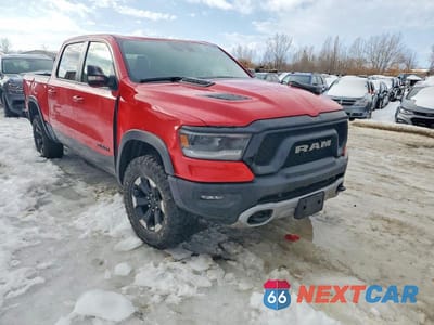 Czwarte zdjęcie samochodu z boku: 2022 RAM 1500 REBEL VIN:1C6SRFLM3NN293622 - miniatura