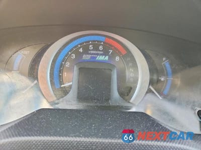 Zdjęcie 9 z 11 samochodu: 2010 HONDA INSIGHT EX VIN:JHMZE2H79AS019172 - miniatura