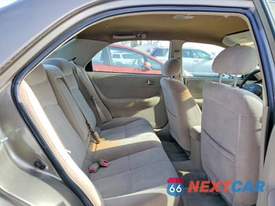 Zdjęcie 10 z 13 samochodu: 2001 MAZDA 626 ES VIN:1YVGF22CX15239215 - miniatura