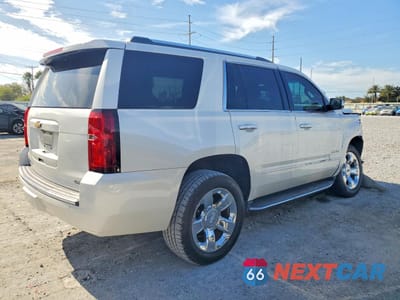 Trzecie zdjęcie samochodu z tyłu: 2017 CHEVROLET TAHOE C1500 PREMIER VIN:1GNSCCKC3HR361391 - miniatura