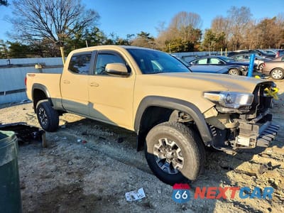 Czwarte zdjęcie samochodu z boku: 2018 TOYOTA TACOMA DOUBLE CAB VIN:3TMDZ5BN9JM038905 - miniatura