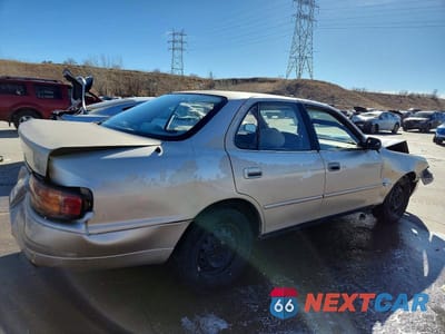 Trzecie zdjęcie samochodu z tyłu: 1994 TOYOTA CAMRY LE VIN:4T1SK12E7RU331032 - miniatura