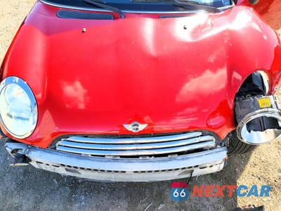 Zdjęcie 11 z 13 samochodu: 2005 MINI COOPER VIN:WMWRC33445TJ64692 - miniatura