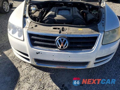 Zdjęcie 12 z 12 samochodu: 2004 VOLKSWAGEN TOUAREG 4.2 VIN:WVGCM77L84D040508 - miniatura