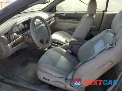 Zdjęcie 7 z 12 samochodu: 2004 CHRYSLER SEBRING LIMITED VIN:1C3EL65R24N154648 - miniatura