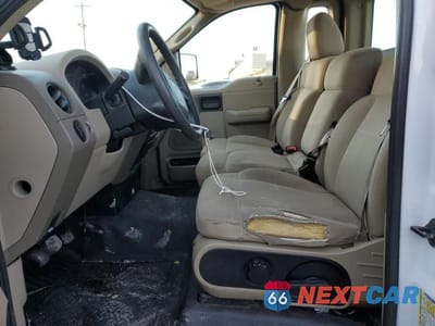 Zdjęcie 7 z 12 samochodu: 2006 FORD F150 VIN:1FTRF12206NB20127 - miniatura