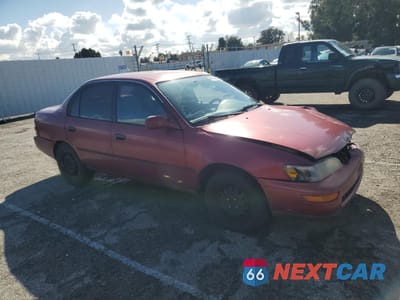 Czwarte zdjęcie samochodu z boku: 1997 TOYOTA COROLLA DX VIN:1NXBB02EXVZ510072 - miniatura