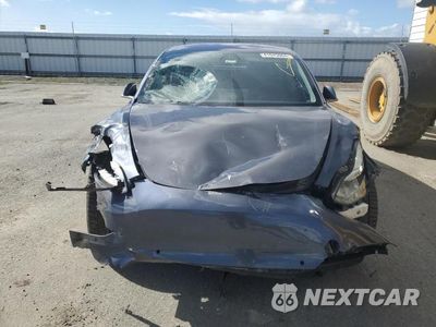 Piąte zdjęcie samochodu w środku: 2018 TESLA MODEL 3 VIN:5YJ3E1EA4JF021474 - miniatura