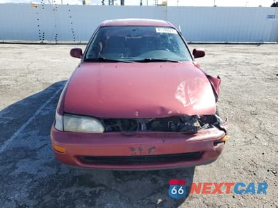 Piąte zdjęcie samochodu w środku: 1997 TOYOTA COROLLA DX VIN:1NXBB02EXVZ510072 - miniatura