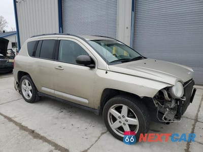 Czwarte zdjęcie samochodu z boku: 2010 JEEP COMPASS LIMITED VIN:1J4NF5FB4AD536545 - miniatura