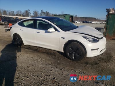 Czwarte zdjęcie samochodu z boku: 2020 TESLA MODEL 3 VIN:5YJ3E1EA5LF706327 - miniatura