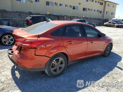 Trzecie zdjęcie samochodu z tyłu: 2018 FORD FOCUS SE VIN:1FADP3F22JL258758 - miniatura