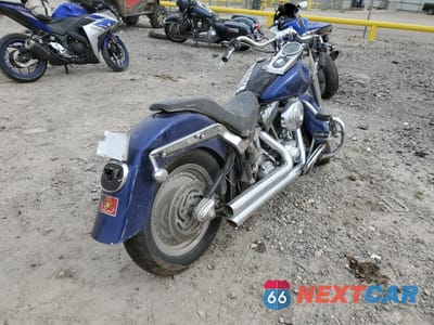Czwarte zdjęcie samochodu z boku: 2006 HARLEY-DAVIDSON FLSTFI VIN:1HD1BXB126Y065325 - miniatura