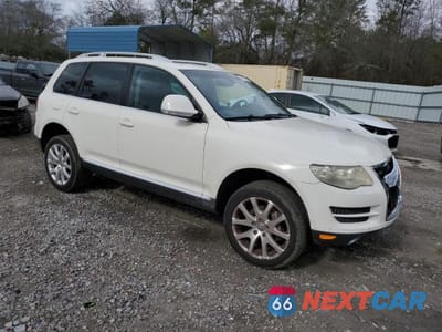 Czwarte zdjęcie samochodu z boku: 2009 VOLKSWAGEN TOUAREG 2 V6 TDI VIN:WVGFM77LX9D036061 - miniatura
