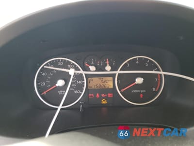 Zdjęcie 9 z 12 samochodu: 2005 HYUNDAI TIBURON GT VIN:KMHHN65F95U181518 - miniatura