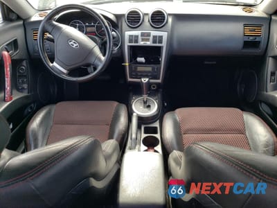 Zdjęcie 8 z 12 samochodu: 2005 HYUNDAI TIBURON GT VIN:KMHHN65F95U181518 - miniatura
