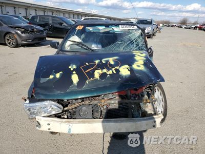 Piąte zdjęcie samochodu w środku: 1995 TOYOTA COROLLA LE VIN:1NXAE09B2SZ337559 - miniatura