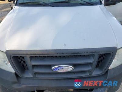 Zdjęcie 11 z 12 samochodu: 2006 FORD F150 VIN:1FTRF12206NB20127 - miniatura
