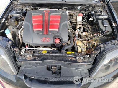 Zdjęcie 11 z 12 samochodu: 2005 HYUNDAI TIBURON GT VIN:KMHHN65F95U181518 - miniatura