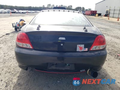 Zdjęcie 10 z 12 samochodu: 2005 HYUNDAI TIBURON GT VIN:KMHHN65F95U181518 - miniatura