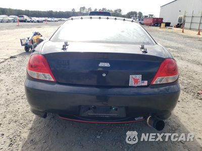 Zdjęcie 10 z 12 samochodu: 2005 HYUNDAI TIBURON GT VIN:KMHHN65F95U181518 - miniatura
