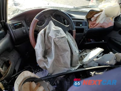 Zdjęcie 8 z 11 samochodu: 1995 TOYOTA COROLLA LE VIN:1NXAE09B2SZ337559 - miniatura