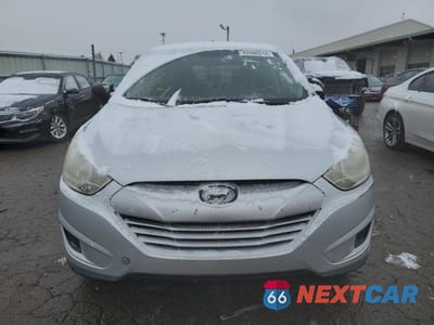 Piąte zdjęcie samochodu w środku: 2012 HYUNDAI TUCSON GL VIN:KM8JT3AB2CU496229 - miniatura