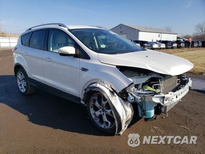 Czwarte zdjęcie samochodu z boku: 2014 FORD ESCAPE TITANIUM VIN:1FMCU0J95EUE09539 - miniatura