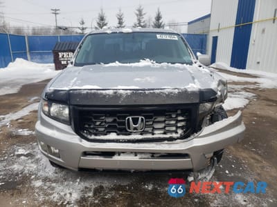 Piąte zdjęcie samochodu w środku: 2014 HONDA RIDGELINE SPECIAL EDITION VIN:5FPYK1F89EB501405 - miniatura