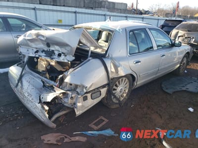 Trzecie zdjęcie samochodu z tyłu: 2010 MERCURY GRAND MARQUIS LS VIN:2MEBM7FV9AX604897 - miniatura