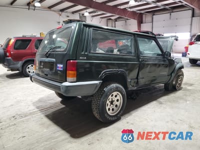 Trzecie zdjęcie samochodu z tyłu: 1997 JEEP CHEROKEE SE VIN:1J4FJ27S8VL528430 - miniatura