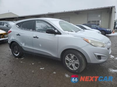 Czwarte zdjęcie samochodu z boku: 2012 HYUNDAI TUCSON GL VIN:KM8JT3AB2CU496229 - miniatura