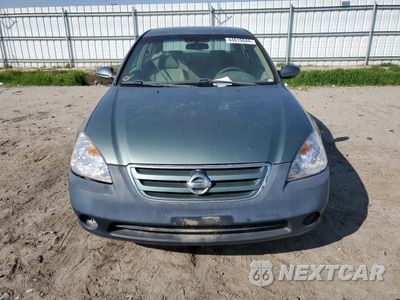 Piąte zdjęcie samochodu w środku: 2004 NISSAN ALTIMA BASE VIN:1N4AL11D44C123880 - miniatura