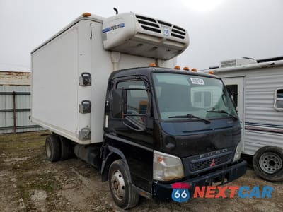 Czwarte zdjęcie samochodu z boku: 2007 MITSUBISHI FUSO TRUCK OF AMERICA INC FE 85D VIN:JL6CCE1S37K007127 - miniatura