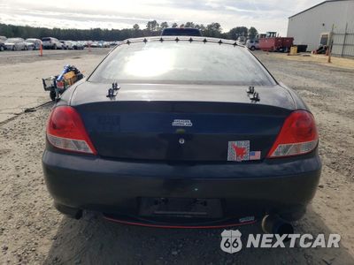 Zdjęcie 6 z 12 samochodu: 2005 HYUNDAI TIBURON GT VIN:KMHHN65F95U181518 - miniatura